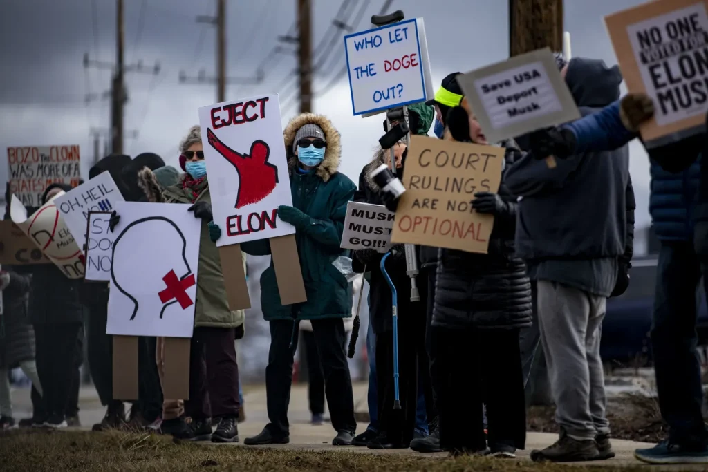 Tesla Takedown Protest Draws Attention at Somerset Mall